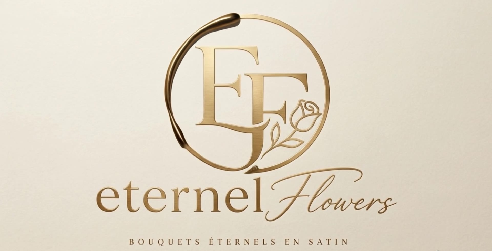 Logo Eternel Flowers doré qui se dessine sur un fond crème